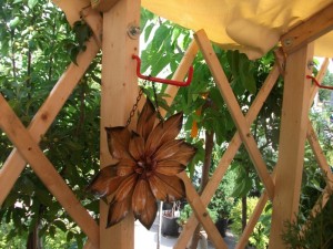 Yurt hooks placed on the wall studs attached to the Khana