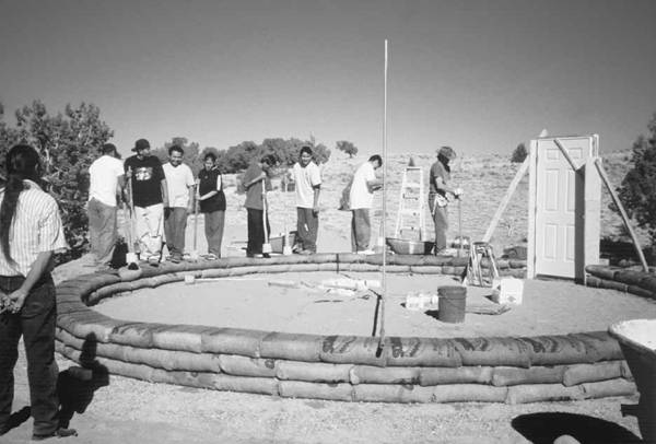 Students working on Community Hogan on the Navajo Indian Reservation.